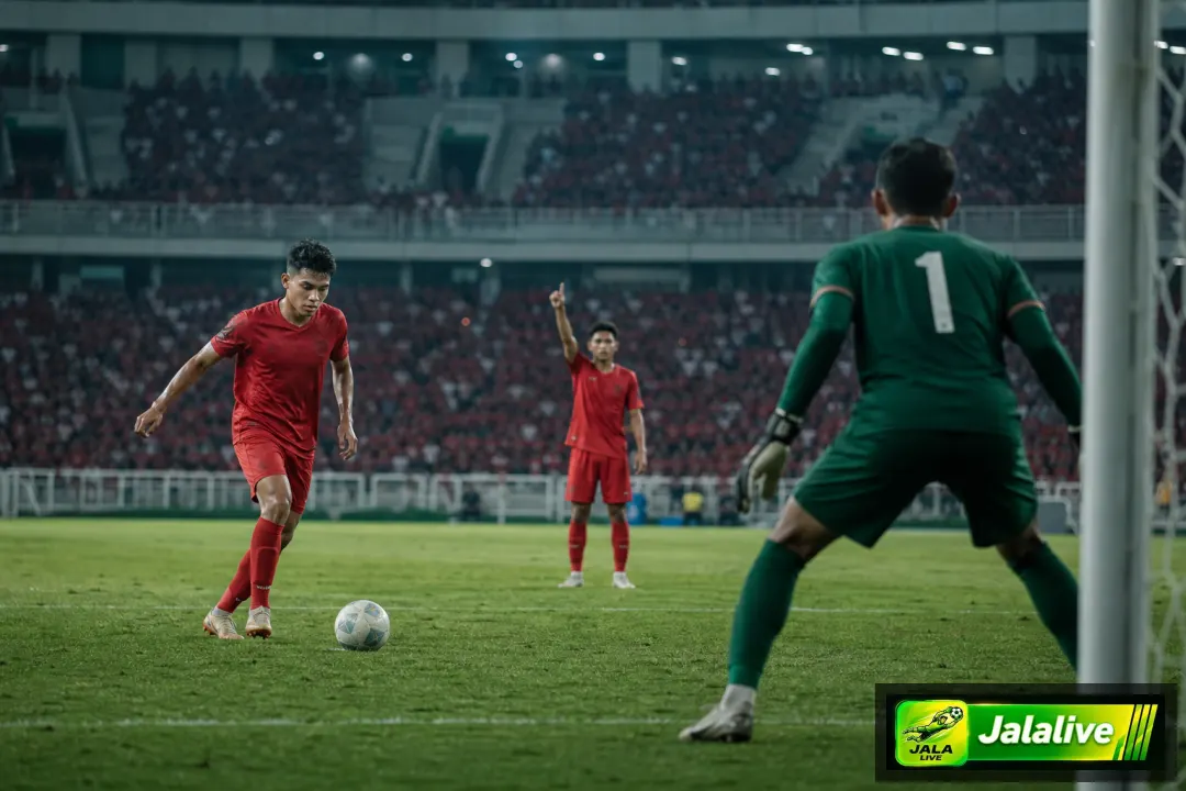 Ilustrasi editorial pemain muda gagal penalti dengan dukungan rekan setim di stadion sepak bola